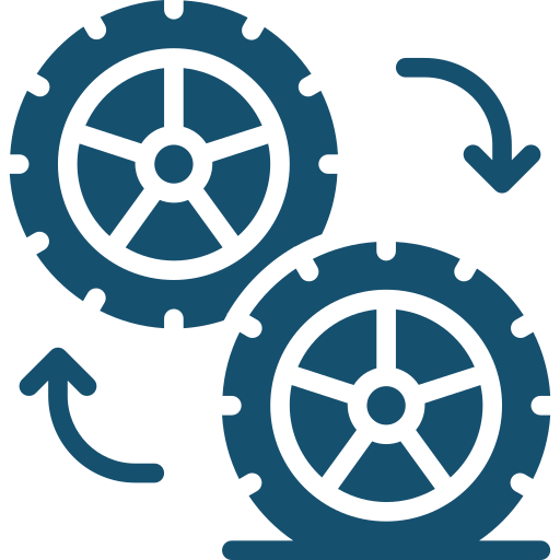 Two blue rotating gears with arrows